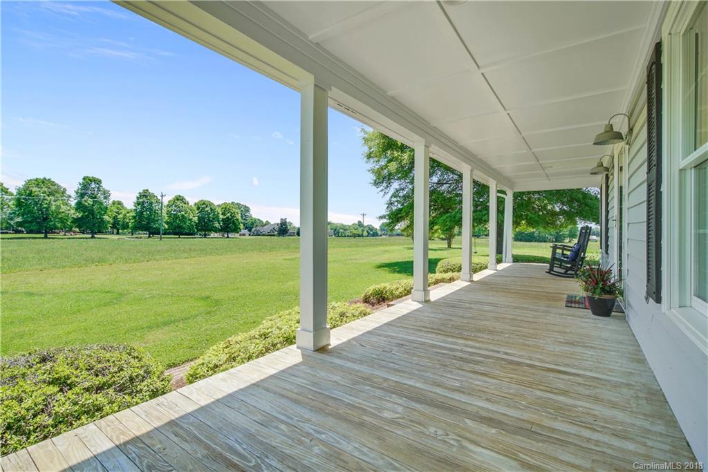 9049 Stacy Howie Road Indian Land, SC 29707 - Photo 5 of 36 a house with garden