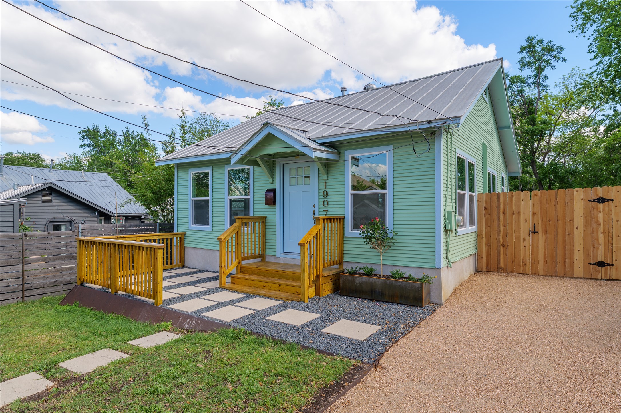 1907 East 21st Street Austin, TX 78722 - Photo 2 of 31 View of front facade with a gate