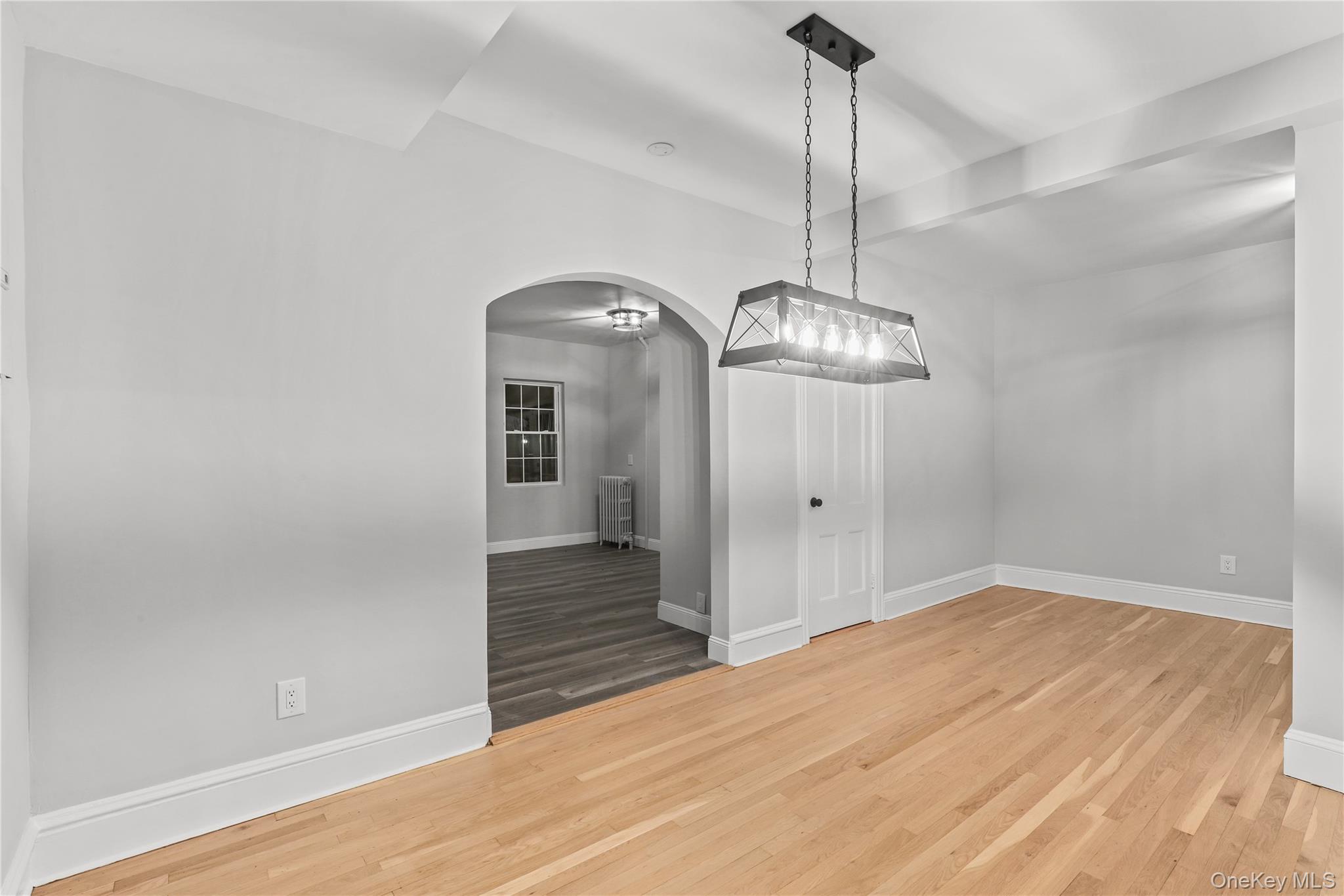 350 Commerce Street Hawthorne, NY 10532 - Photo 13 of 22 a view of empty room with wooden floor and fan
