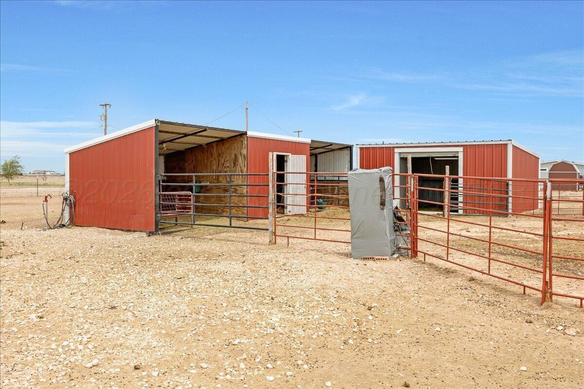 10551 Anderson Road Amarillo, TX 79118 - Photo 3 of 28 a view of a house with a yard