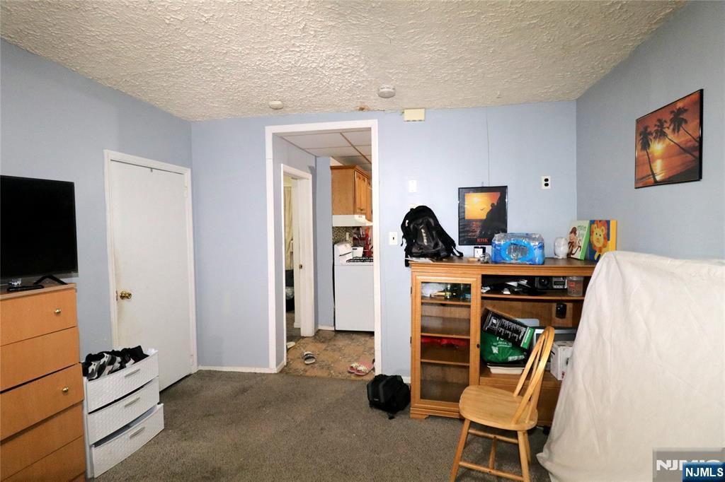 233-235 Adams Street Newark, NJ 07105 - Photo 9 of 20 a view of a workspace with furniture