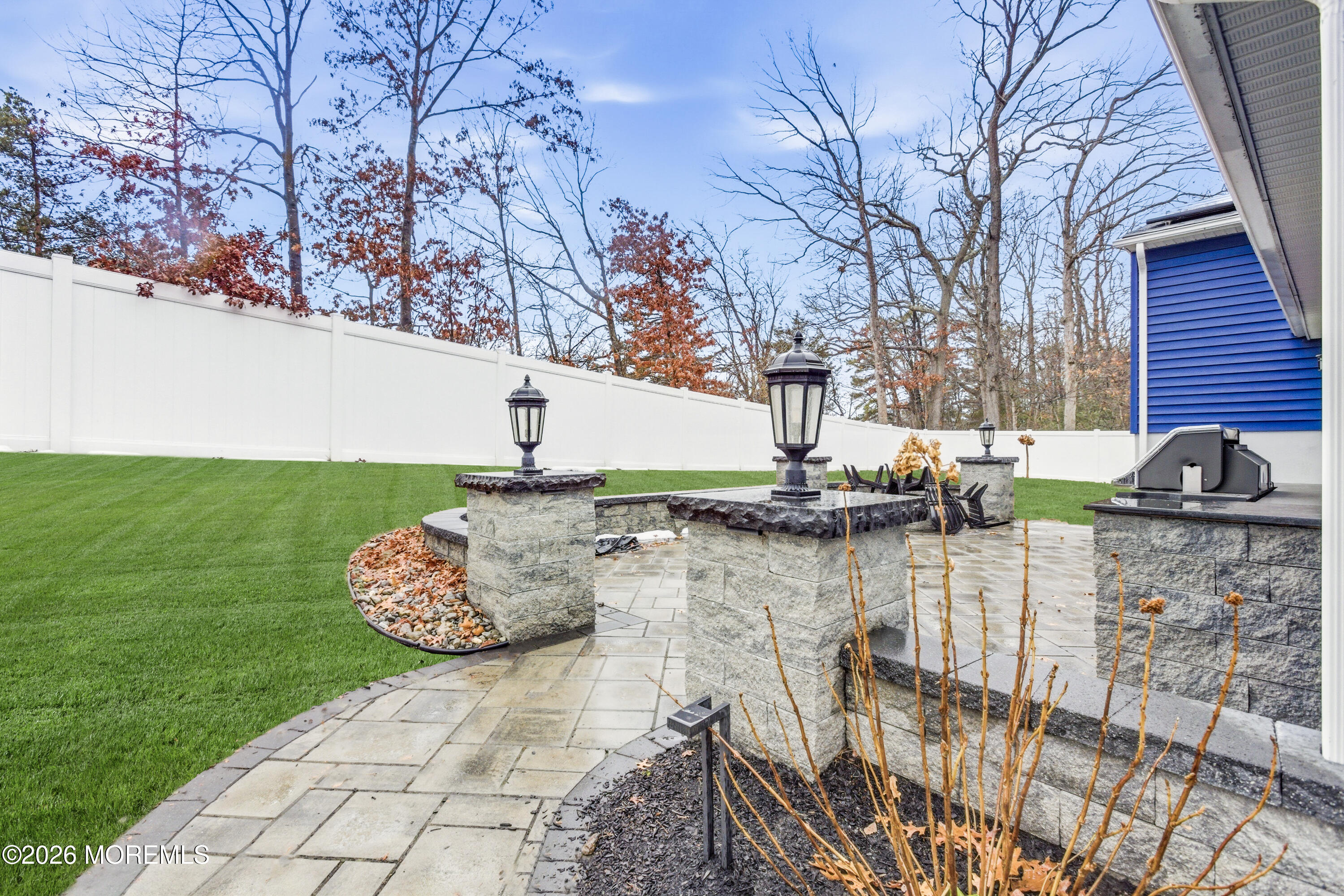 19 Silversmith Court Howell, NJ 07731 - Photo 13 of 48 a view of a backyard with sitting area