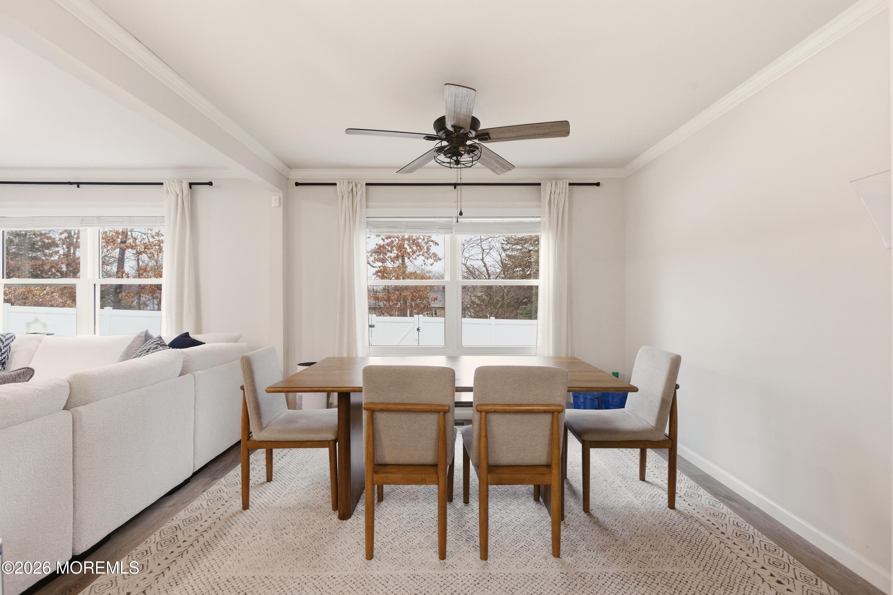 19 Silversmith Court Howell, NJ 07731 - Photo 14 of 48 a view of a dining room with furniture window and outside view