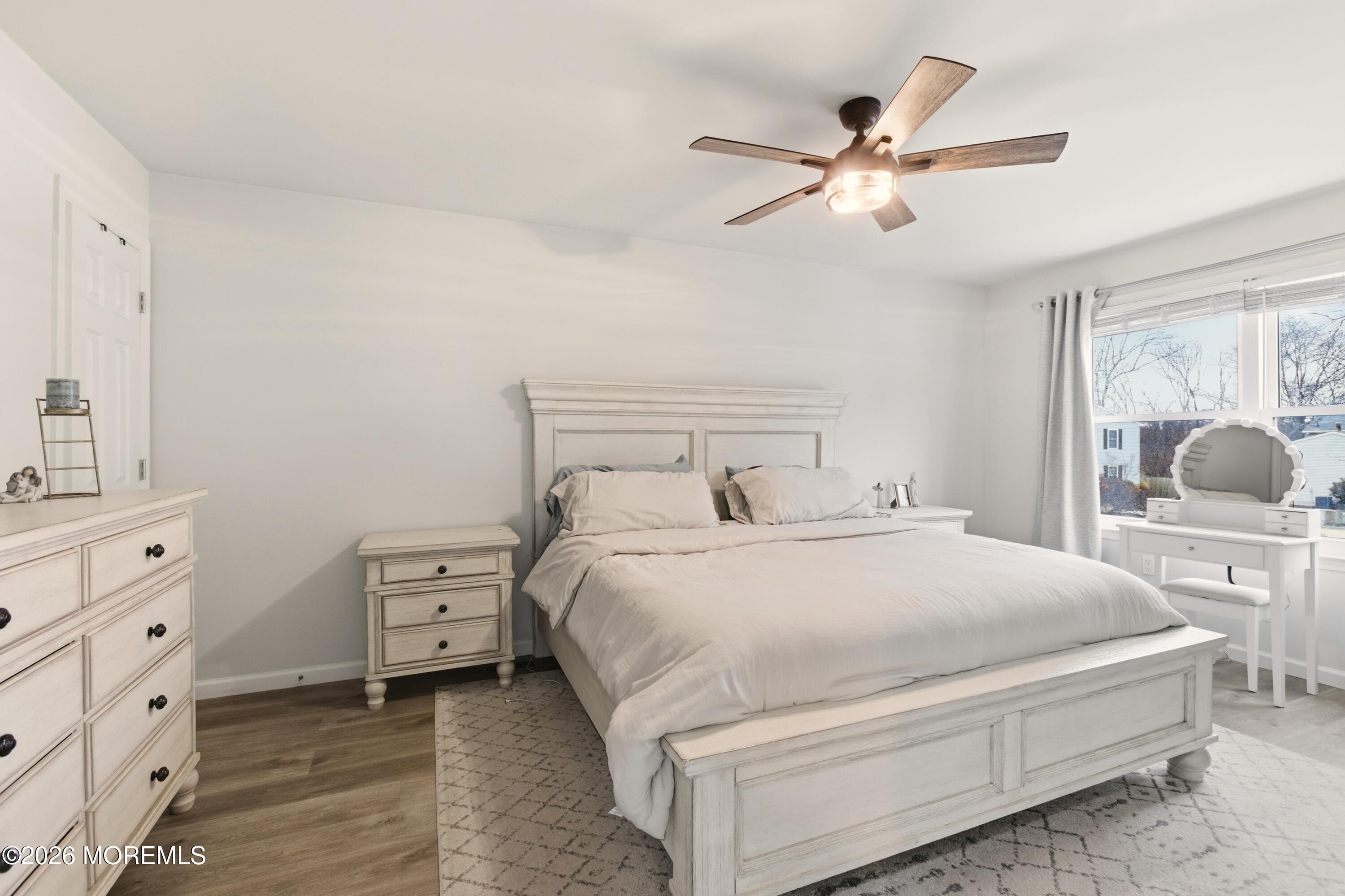 19 Silversmith Court Howell, NJ 07731 - Photo 26 of 48 a bedroom with a bed and a window