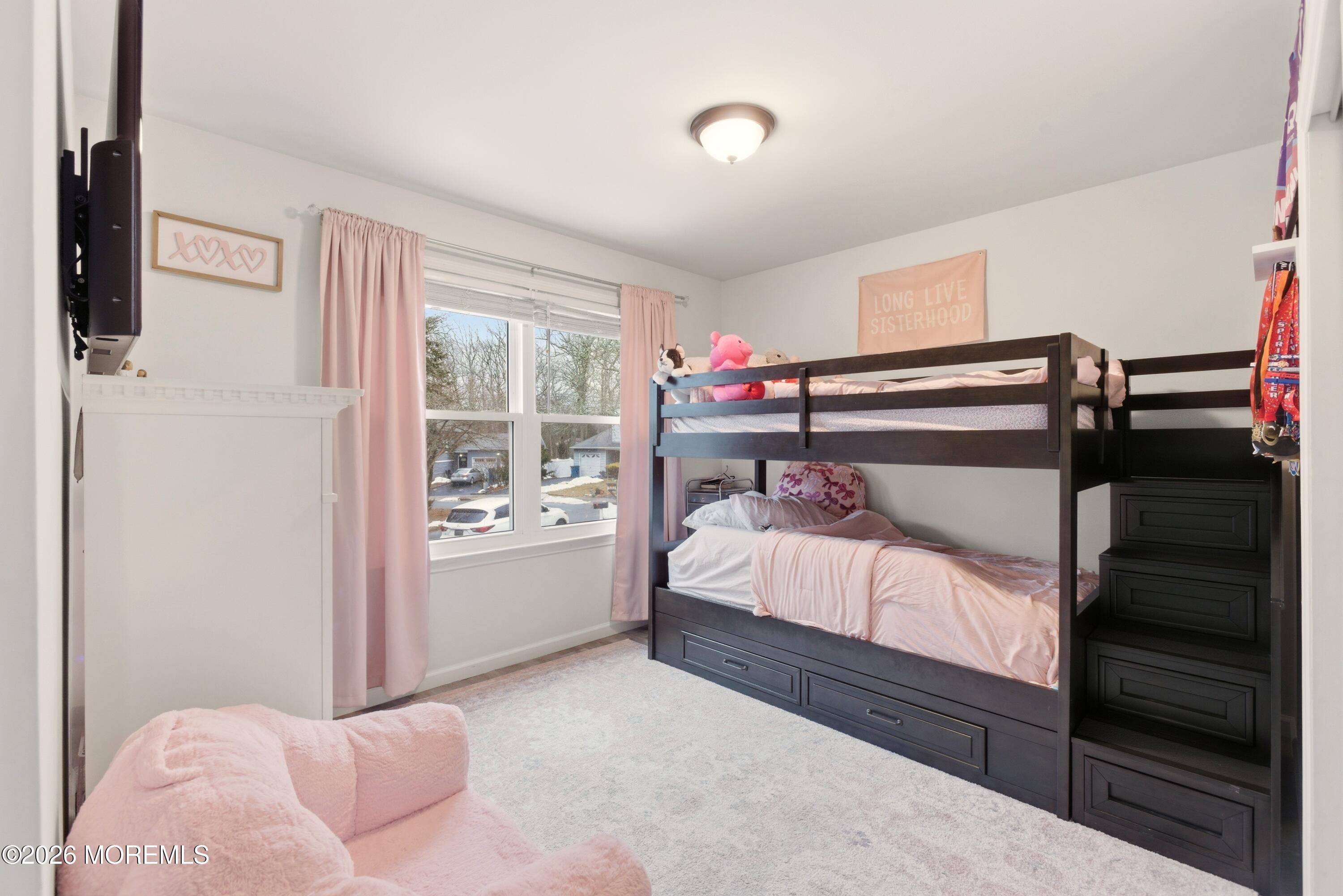 19 Silversmith Court Howell, NJ 07731 - Photo 27 of 48 a bedroom with a bed and a window