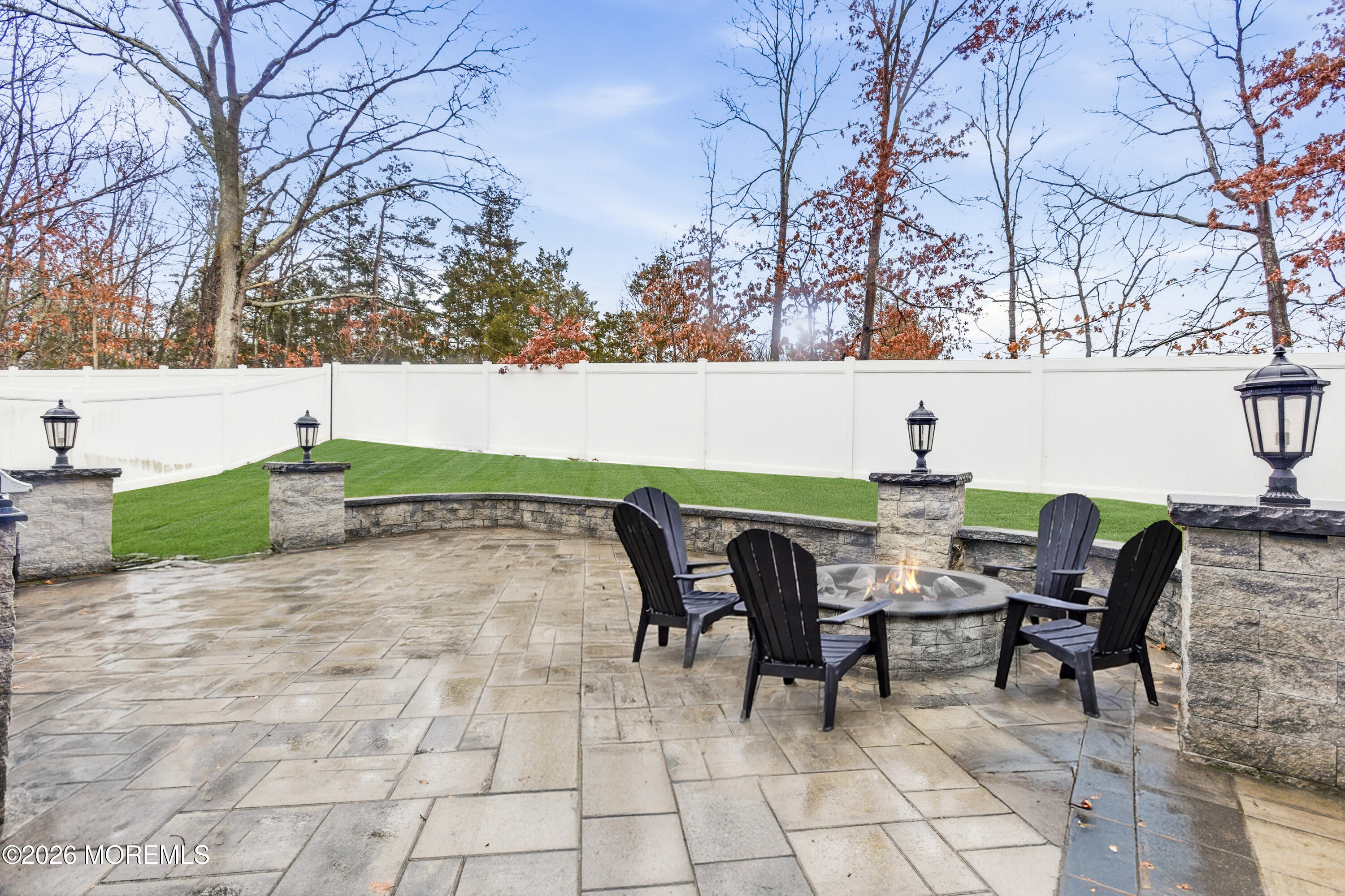 19 Silversmith Court Howell, NJ 07731 - Photo 42 of 48 a view of backyard with seating and green space
