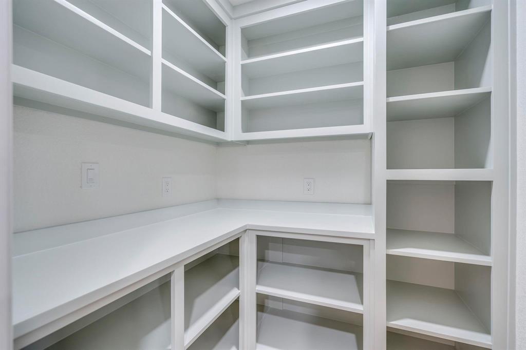 6030 Blue Mist Lane Dallas, TX 75248 - Photo 15 of 29 a view of an empty walk in closet