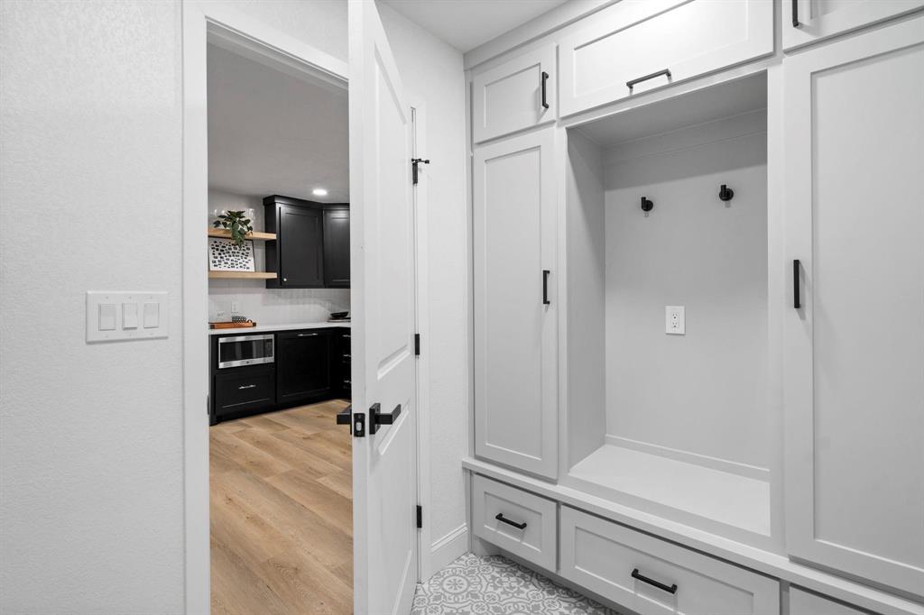 6030 Blue Mist Lane Dallas, TX 75248 - Photo 24 of 29 a bathroom with a tub shower and sink