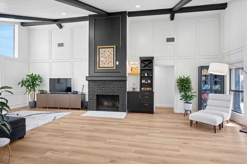 6030 Blue Mist Lane Dallas, TX 75248 - Photo 6 of 29 a living room with furniture and a fireplace