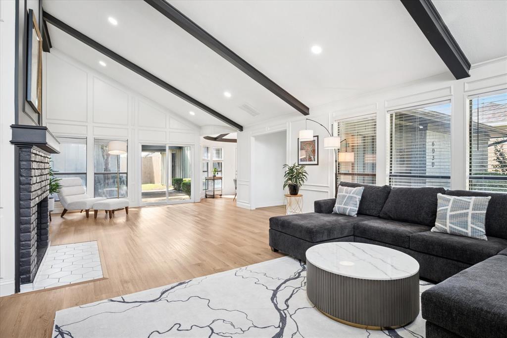 6030 Blue Mist Lane Dallas, TX 75248 - Photo 8 of 29 a living room with furniture and wooden floor