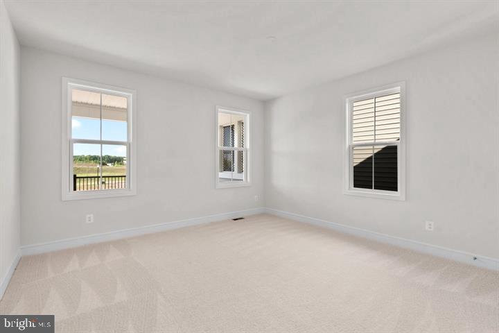 43290 Greeley Square Ashburn, VA 20148 - Photo 21 of 39 an empty room with windows
