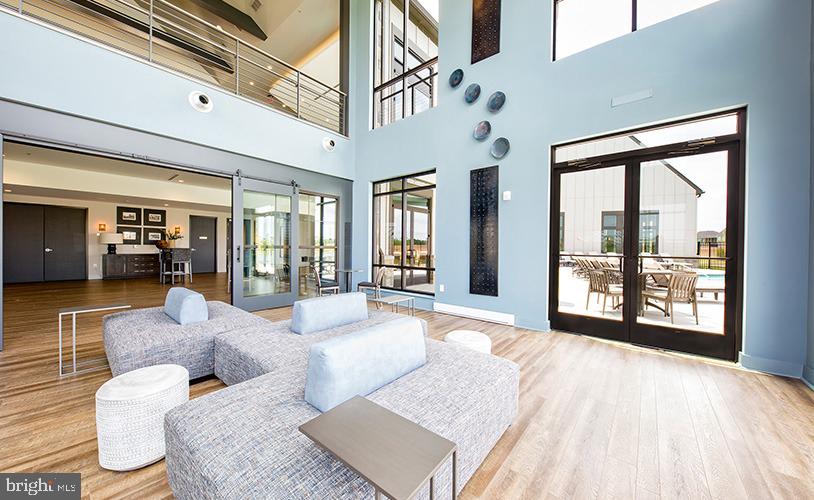 43290 Greeley Square Ashburn, VA 20148 - Photo 33 of 39 a living room with furniture and large windows