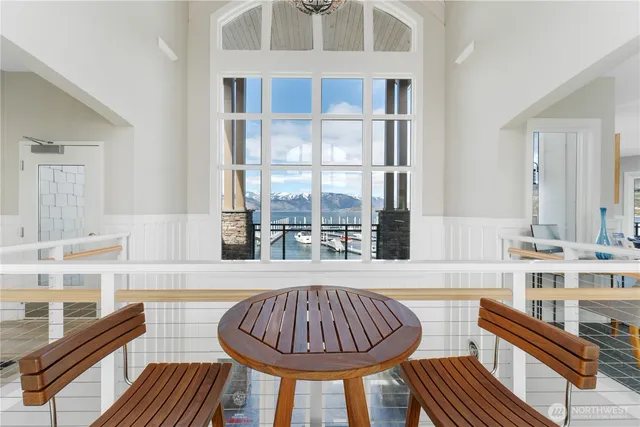 a view of a kitchen with a window and furniture