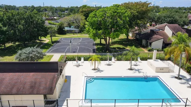 aerial view of a house with a swimming pool