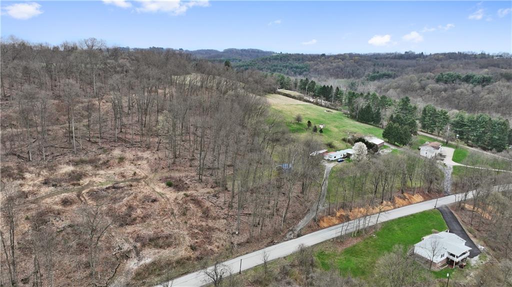 700 Sugar Run Road Eighty Four, PA 15330 - Photo 3 of 25 a view of a lake with a mountain in the background