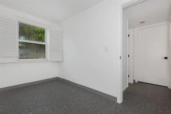 an empty room with a window