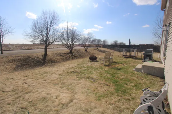 a view of a yard with an outdoor space