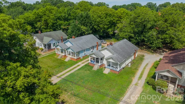 an aerial view of a house with a garden