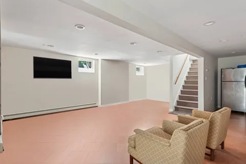 a view of livingroom with furniture and stairs