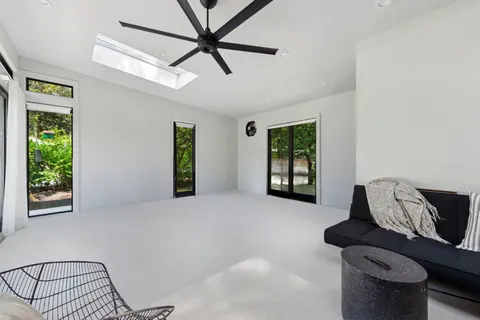 a living room with furniture and window