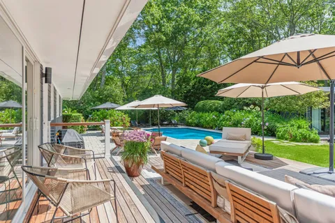 a view of outdoor space yard deck patio and outdoor kitchen