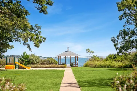 a view of a garden with a lake view