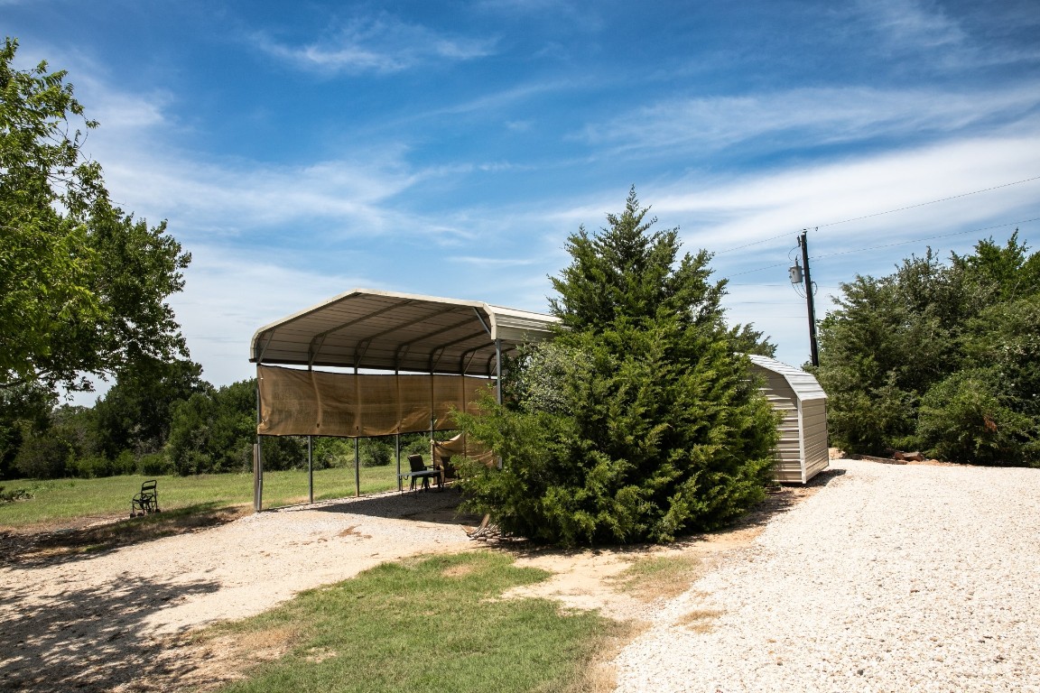 5427 Mustang Road Brenham, TX 77833 - Photo 11 of 19 a view of a backyard