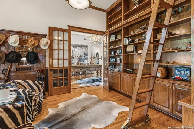 a view of a room with racks on the wall