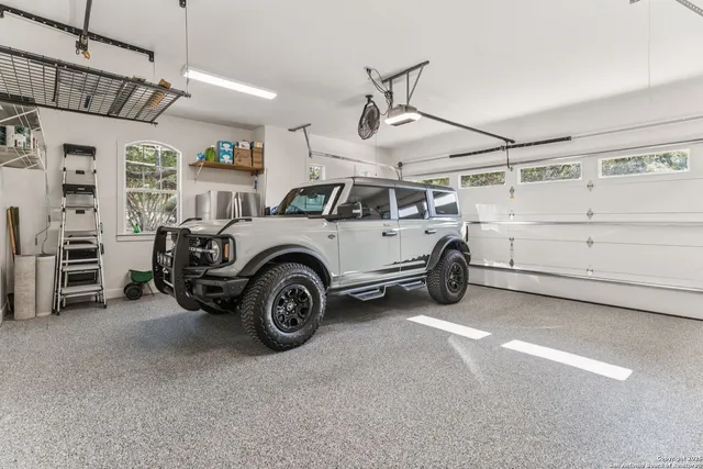 a view of a lake with a house in the background
