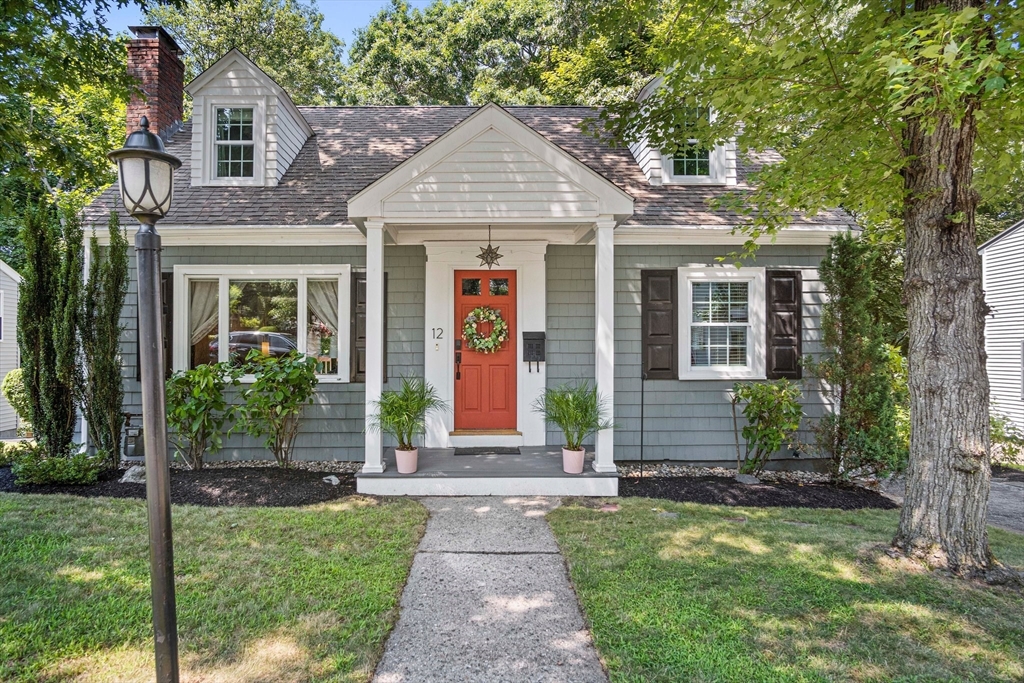 12 Renwick Road Melrose, MA 02176 - Photo 1 of 40 front view of a house with a yard