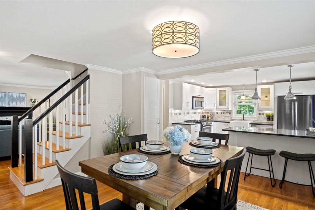 12 Renwick Road Melrose, MA 02176 - Photo 12 of 40 a view of a dining room that has a table and chairs