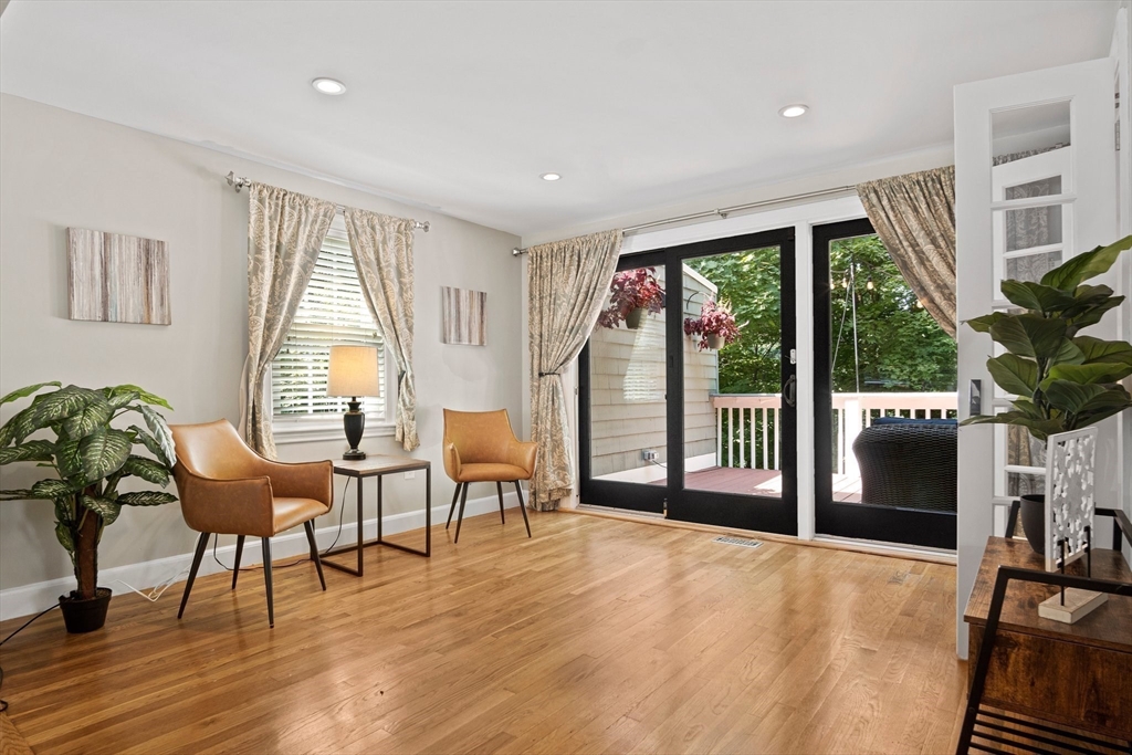 12 Renwick Road Melrose, MA 02176 - Photo 16 of 40 a view of an entryway with wooden floor and windows
