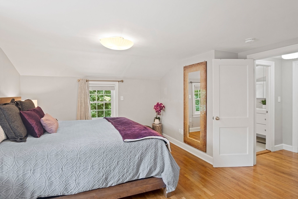 12 Renwick Road Melrose, MA 02176 - Photo 20 of 40 a bedroom with a bed and a window