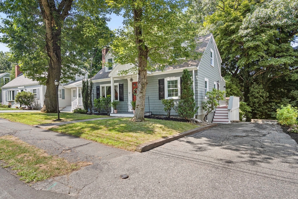 12 Renwick Road Melrose, MA 02176 - Photo 2 of 40 a view of a house with a backyard and large tree