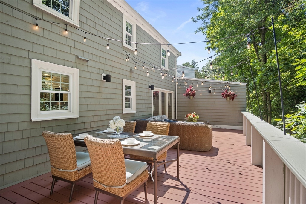 12 Renwick Road Melrose, MA 02176 - Photo 33 of 40 a balcony with table and chairs