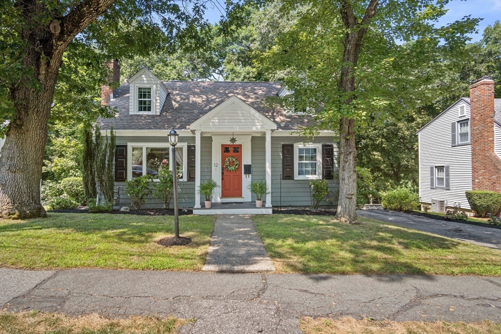 12 Renwick Road Melrose, MA 02176 - Photo 4 of 40 a front view of a house with a yard