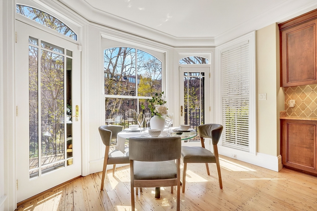 70 Montgomery Street Boston, MA 02116 - Photo 13 of 42 a dining room with furniture window wooden floor