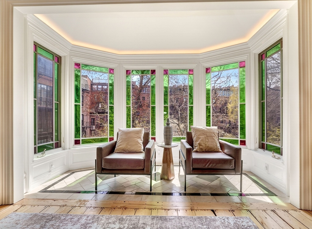 70 Montgomery Street Boston, MA 02116 - Photo 22 of 42 a living room with furniture and a large window