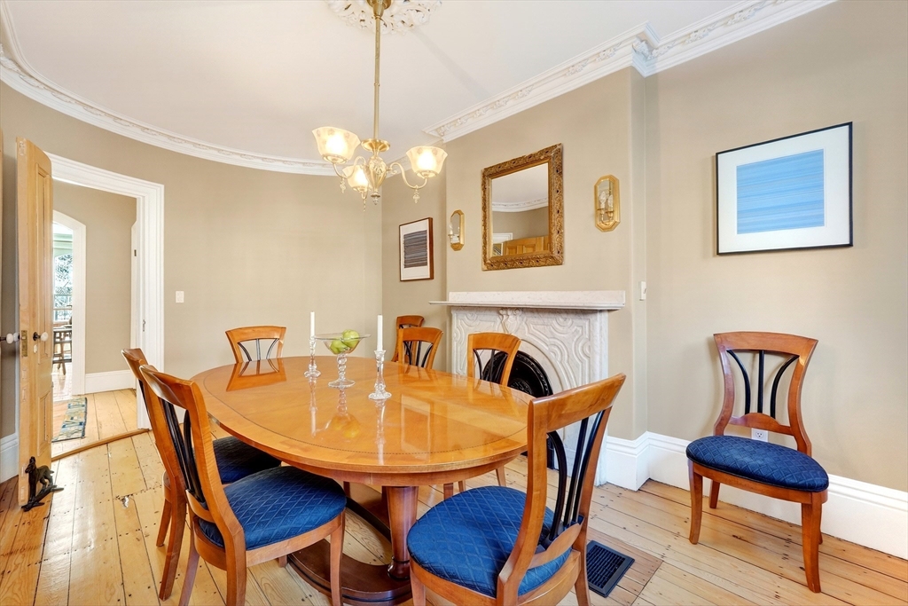 70 Montgomery Street Boston, MA 02116 - Photo 8 of 42 a view of a dining room with furniture and wooden floor
