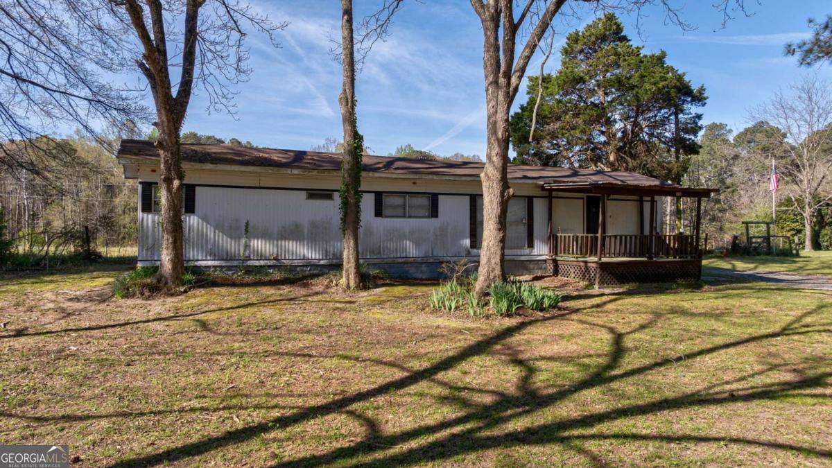 8986 Highway 29 Hull, GA 30646 - Photo 12 of 34 a view of house with backyard porch and sitting area