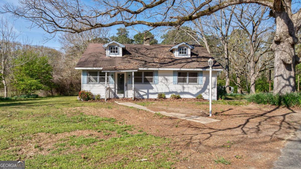 8986 Highway 29 Hull, GA 30646 - Photo 13 of 34 a front view of a house with a yard