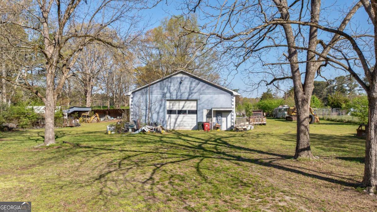 8986 Highway 29 Hull, GA 30646 - Photo 15 of 34 a front view of a house with a yard