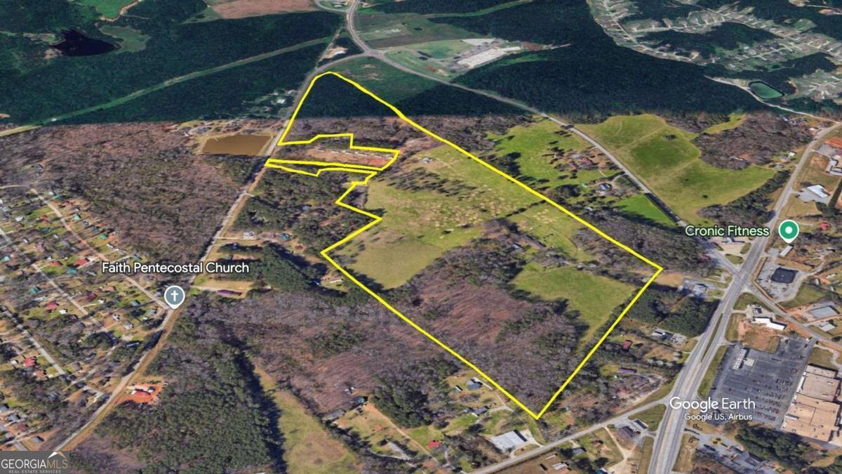 8986 Highway 29 Hull, GA 30646 - Photo 2 of 34 an aerial view of a backyard