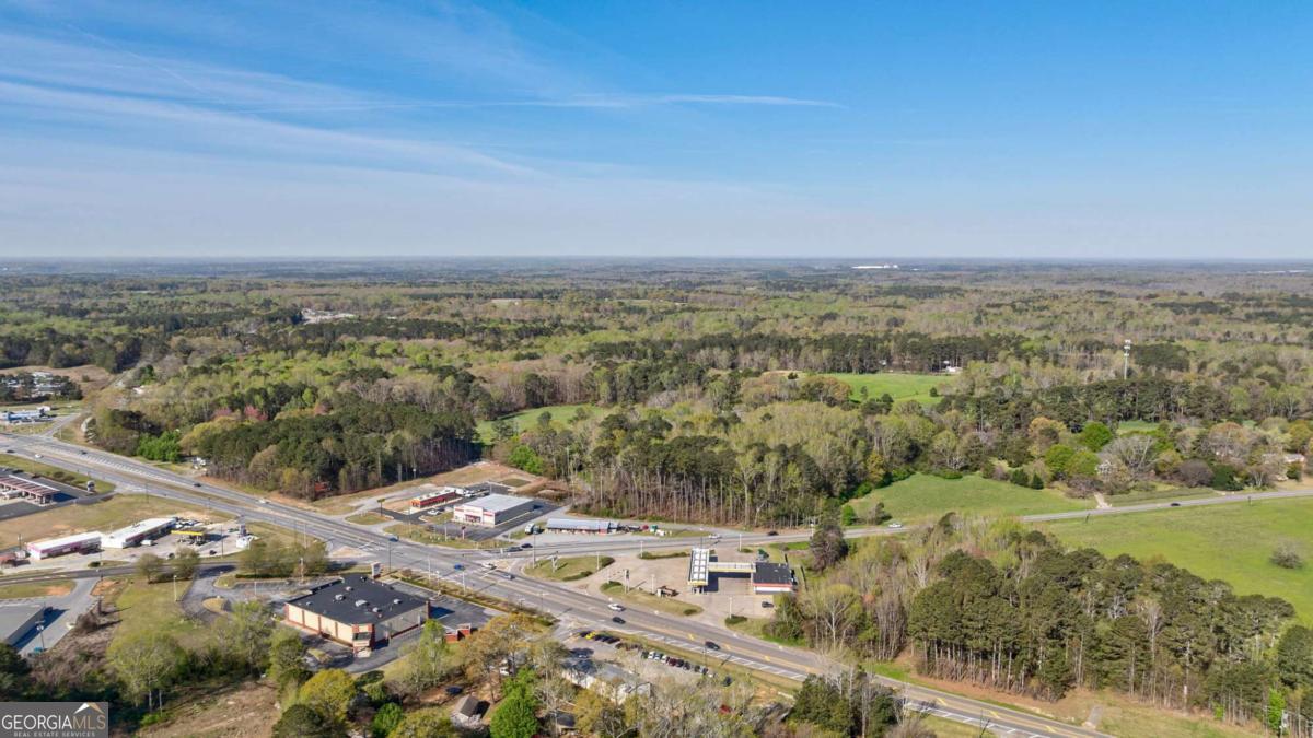 8986 Highway 29 Hull, GA 30646 - Photo 6 of 34 an aerial view of a city
