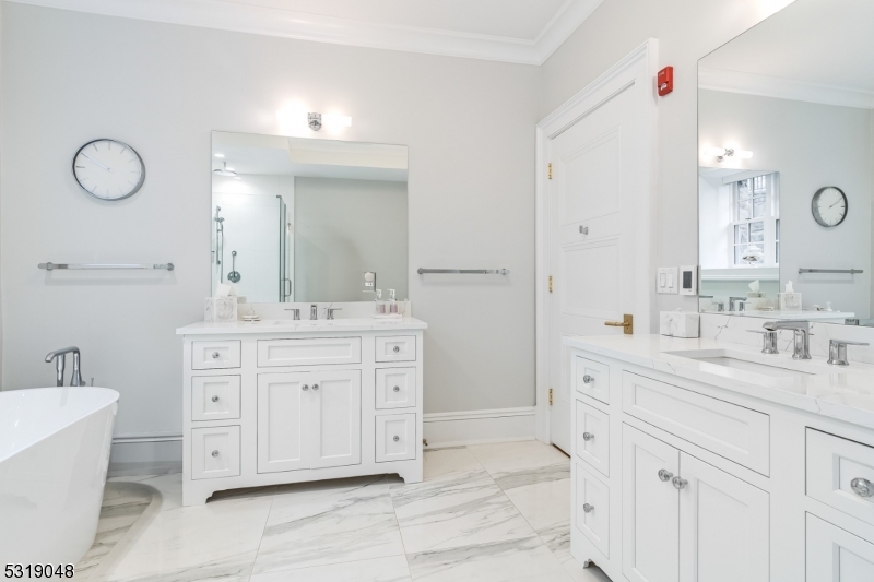80 Claremont Road, Unit 802 Bernardsville, NJ 07924 - Photo 11 of 22 a spacious bathroom with a double vanity sink mirror and double