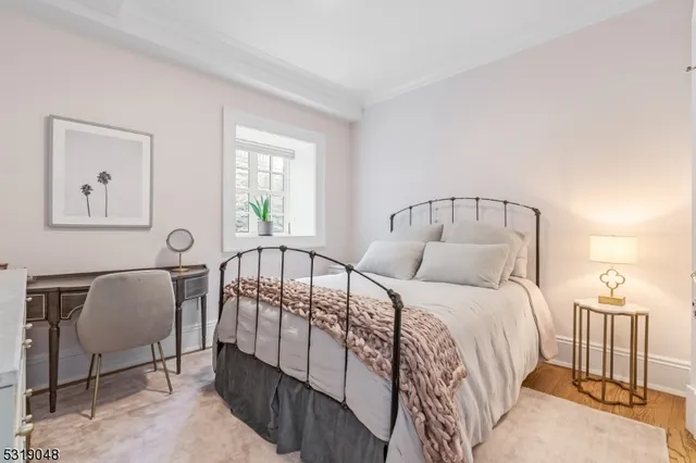 a room with gym equipment and a flat screen tv