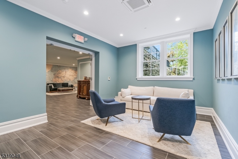 80 Claremont Road, Unit 802 Bernardsville, NJ 07924 - Photo 18 of 22 a living room with furniture and a window
