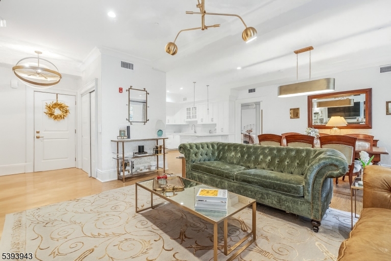 80 Claremont Road, Unit 802 Bernardsville, NJ 07924 - Photo 6 of 22 a living room with furniture and wooden floor