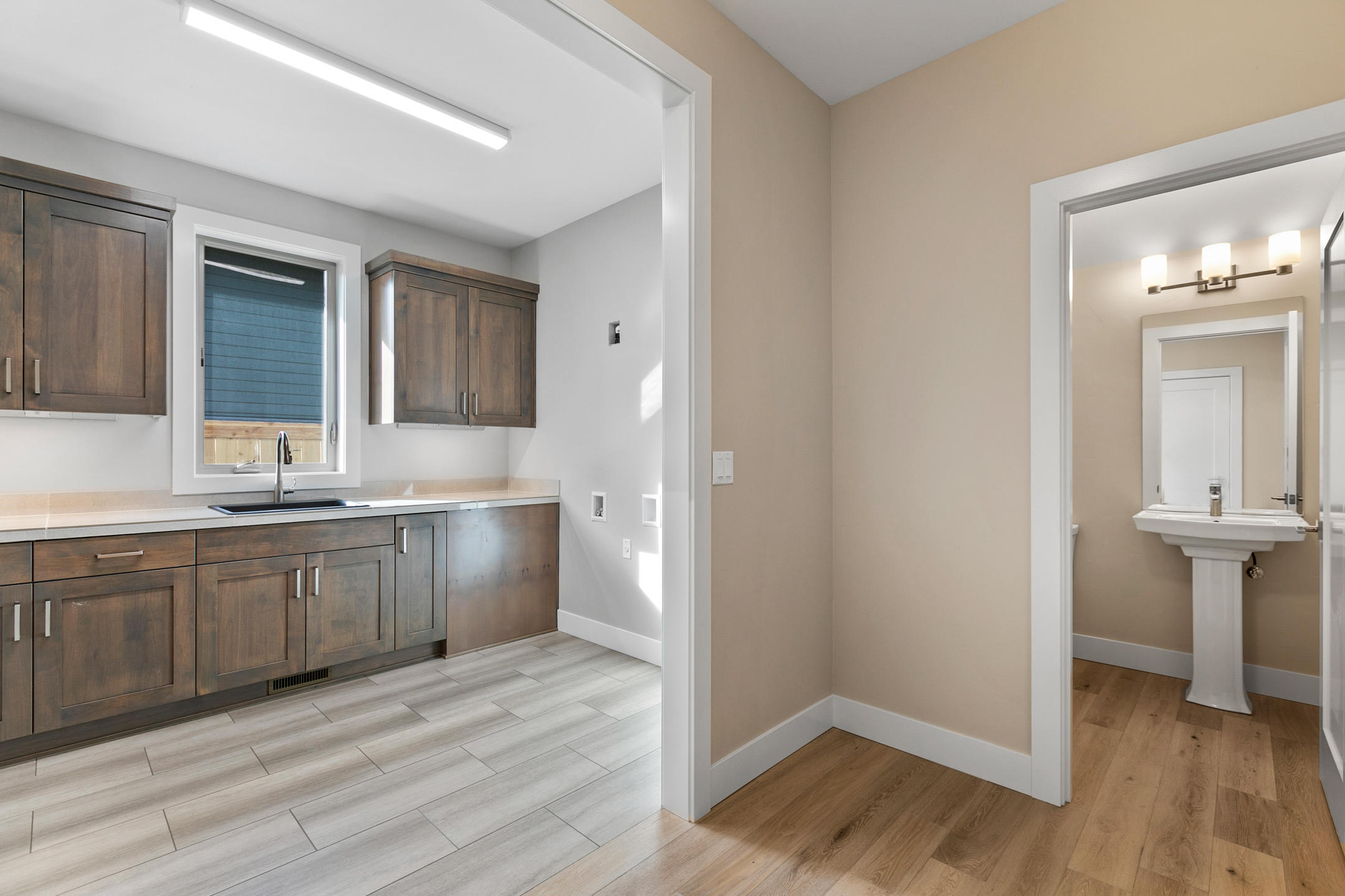 2347 Northwest Awbrey Road Bend, OR 97703 - Photo 7 of 18 a kitchen with a sink cabinets and wooden floor