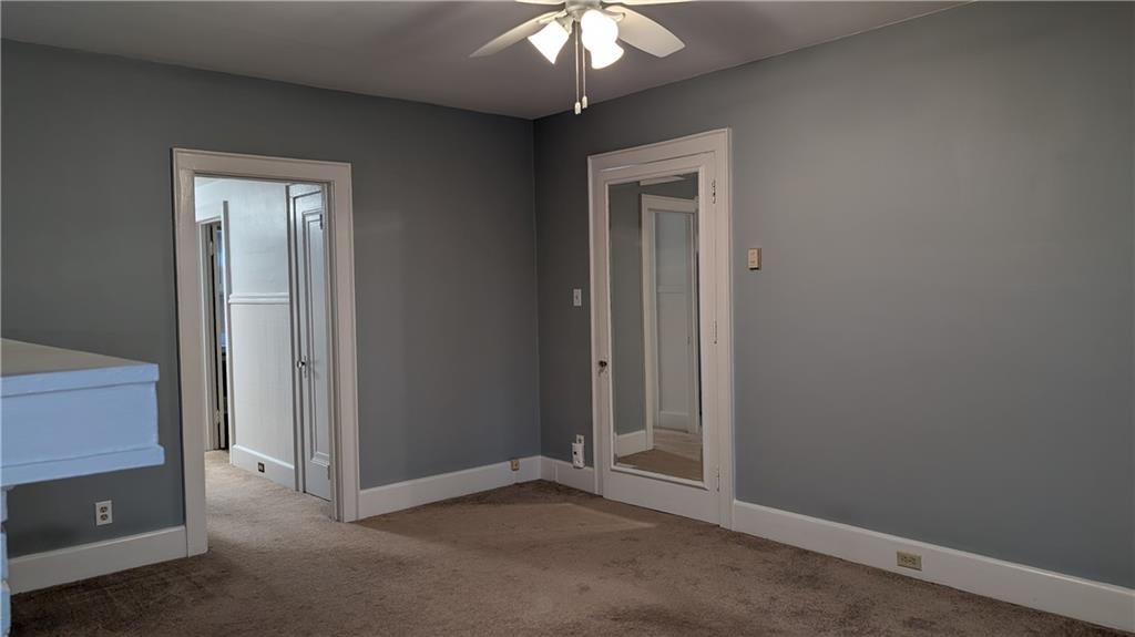 4068 Brandon Road Pittsburgh, PA 15212 - Photo 6 of 16 an empty room with a mirror
